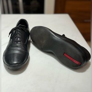 Black leather lace-up Prada Oxford dress shoe